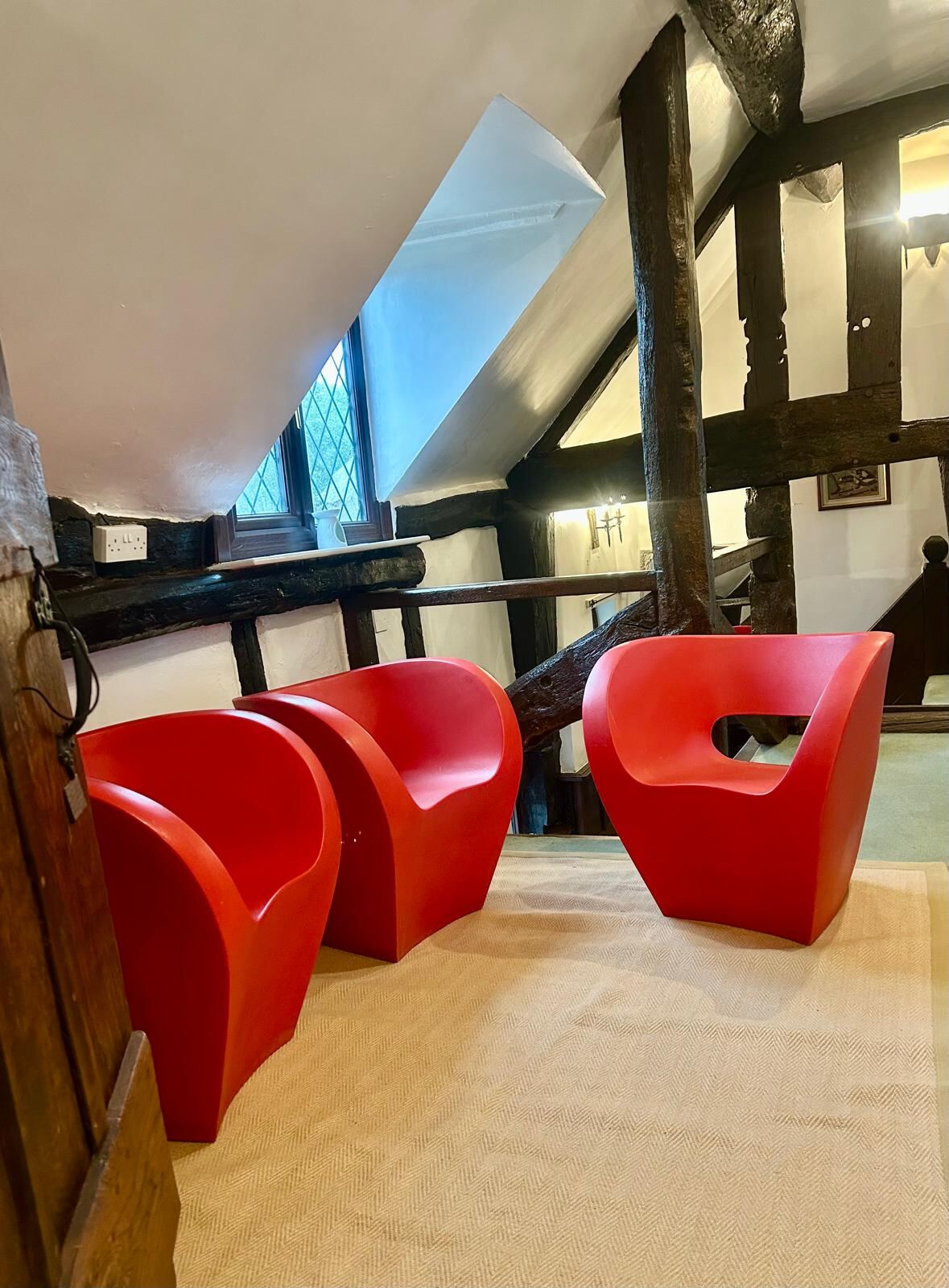 Tom Vac chairs against ancient timbers